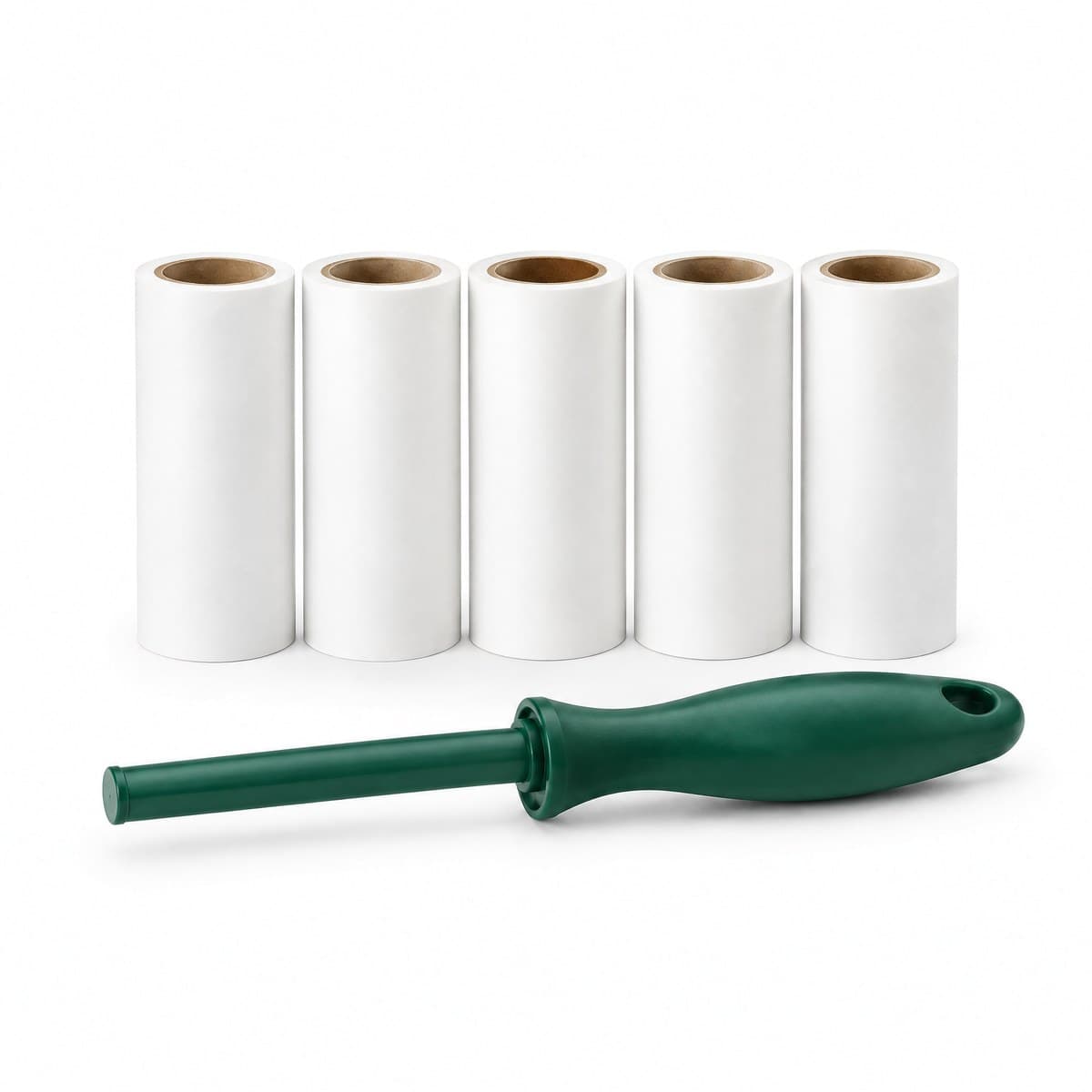 Five white lint roller refill rolls in a row with a forest green lint roller handle in front