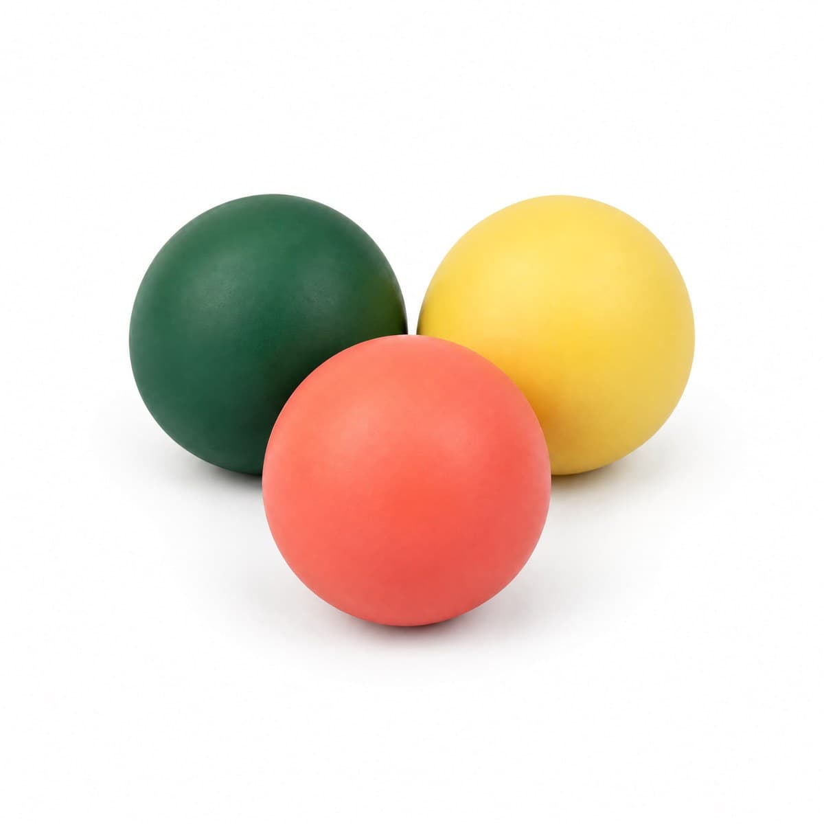 Three smooth rubber balls in forest green, yellow and coral